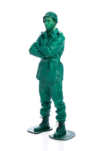 Man on a green toy soldier costume — Stock Photo, Image