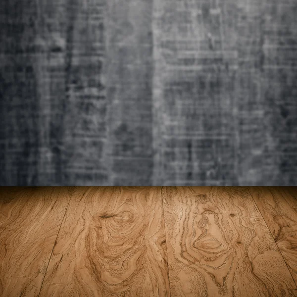 Table with wooden wall — Stock Photo, Image