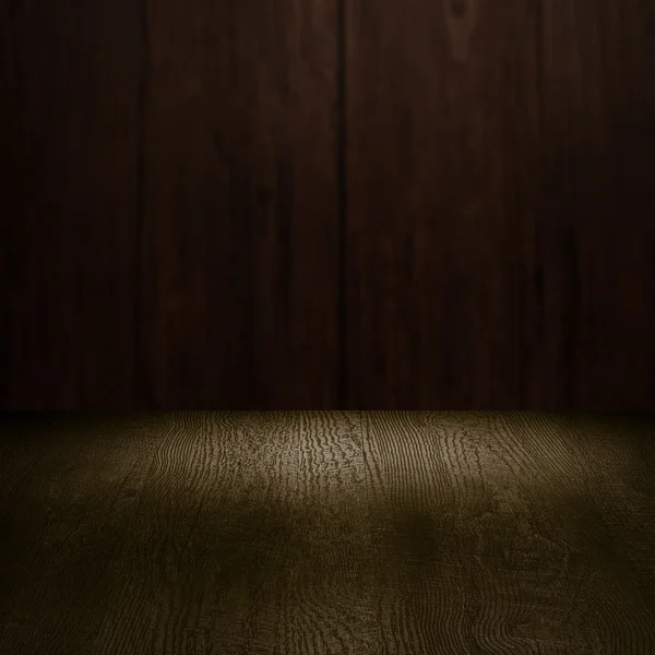 Tabel met houten muur — Stockfoto