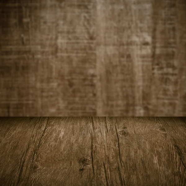 Table with wooden wall — Stock Photo, Image