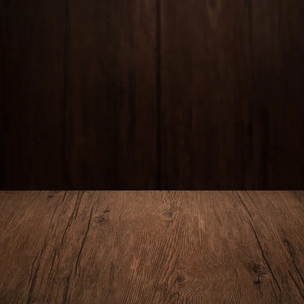 Table with wooden wall — Stock Photo, Image