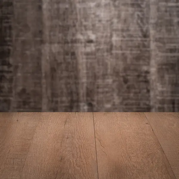 Table with wooden wall — Stock Photo, Image