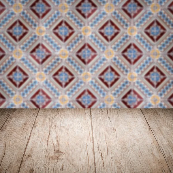 Wood table top and blur  ceramic tile  wall in background — Stock Photo, Image