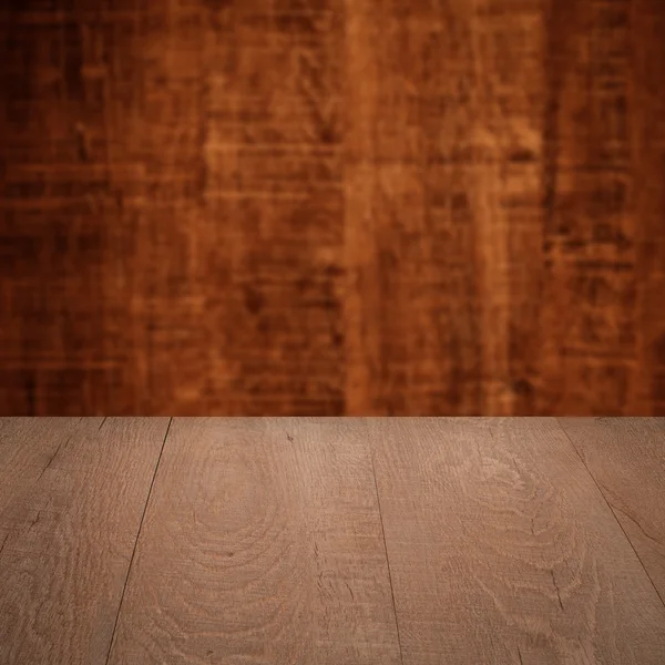 Table with wooden wall — Stock Photo, Image