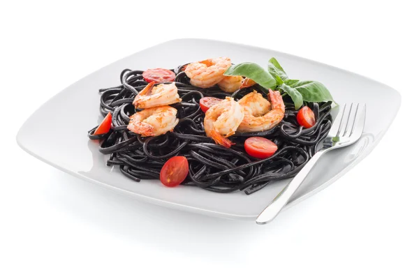 Black spaghetti with shrimps — Stock Photo, Image