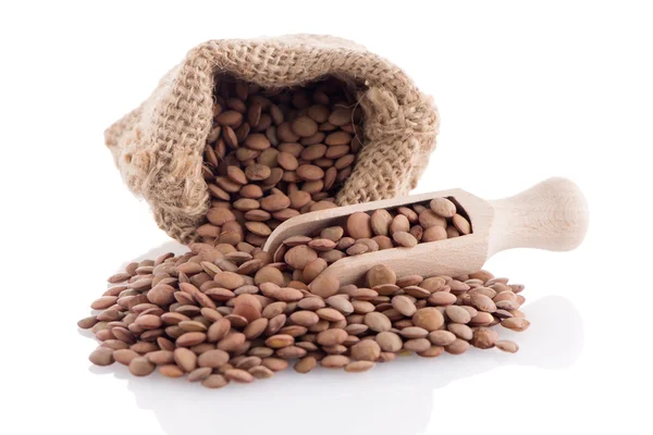Burlap bag with lentils — Stock Photo, Image