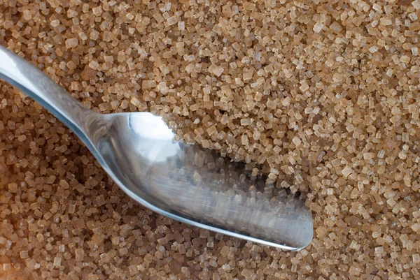 Browm açúcar e colher — Fotografia de Stock
