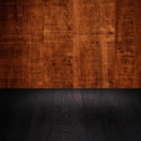 Mesa com parede de madeira — Fotografia de Stock