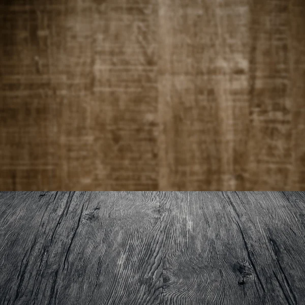 Table with wooden wall — Stock Photo, Image