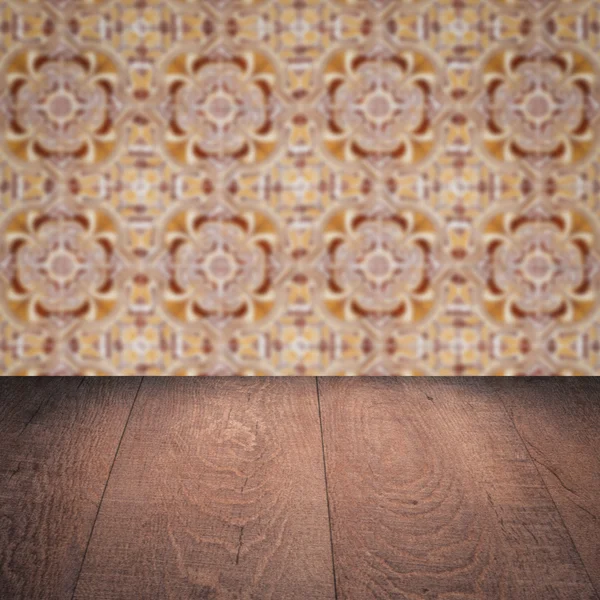 Wood table top and blur   ceramic tile  wall in background — Stock Photo, Image