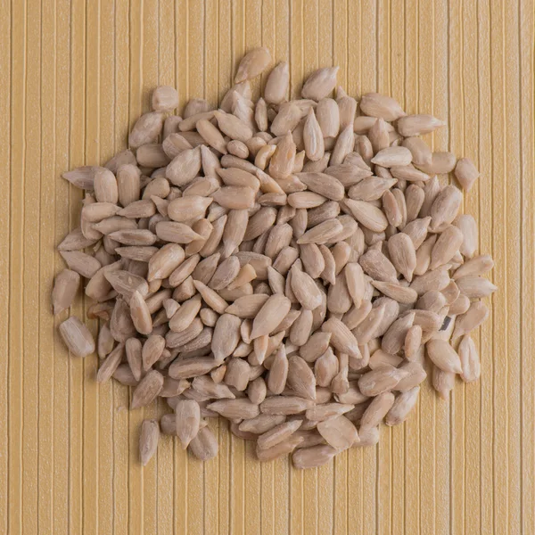 Circle of shelled sunflower seeds — Stock Photo, Image