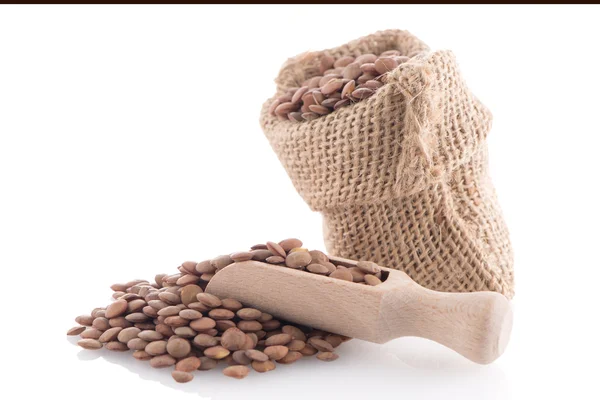 Burlap bag with lentils — Stock Photo, Image