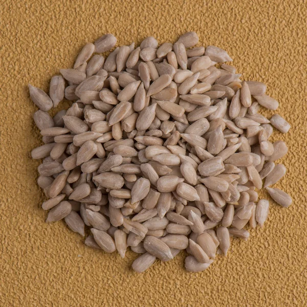 Circle of shelled sunflower seeds — Stock Photo, Image