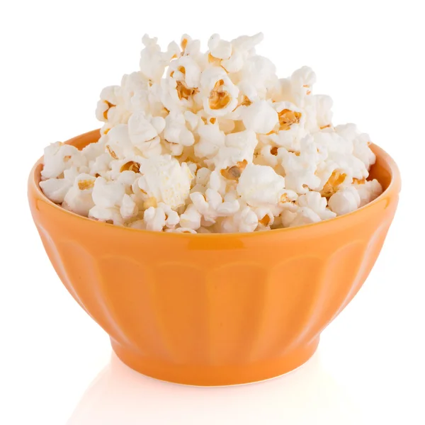 Popcorn w misce pomarańczowy — Zdjęcie stockowe