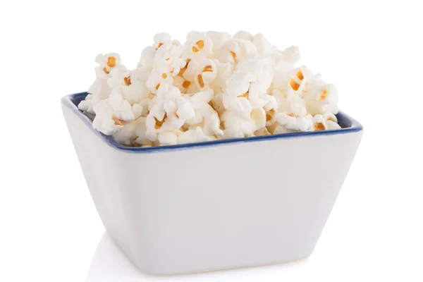 Popcorn in a white bowl — Stock Photo, Image