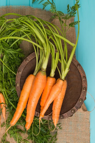 Carrots on a wooden table — Stock Photo, Image