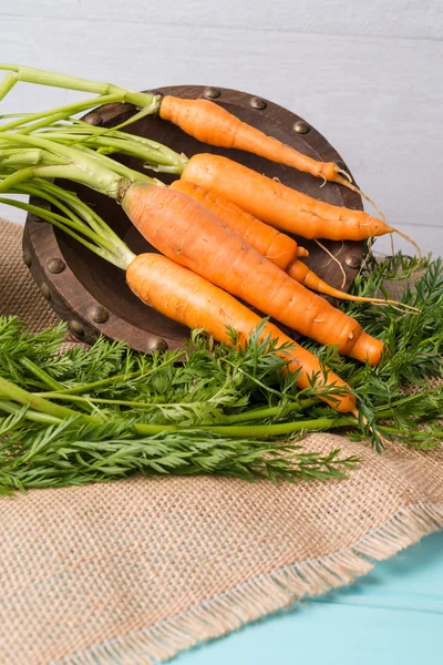 Carrots on a wooden table — Stock Photo, Image