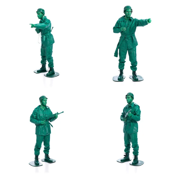 Four man on a green toy soldier costume — Stock Photo, Image