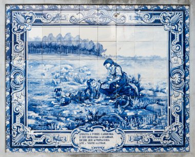 Panel of traditional Portuguese tiles hand-painted blue and whit clipart