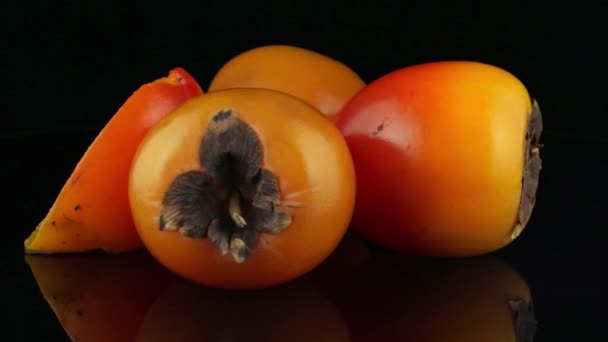 Red ripe persimmons — Stock Video