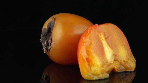 Red ripe persimmons — Stock Video