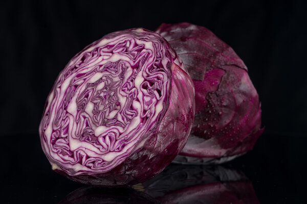 Red cabbage on black background