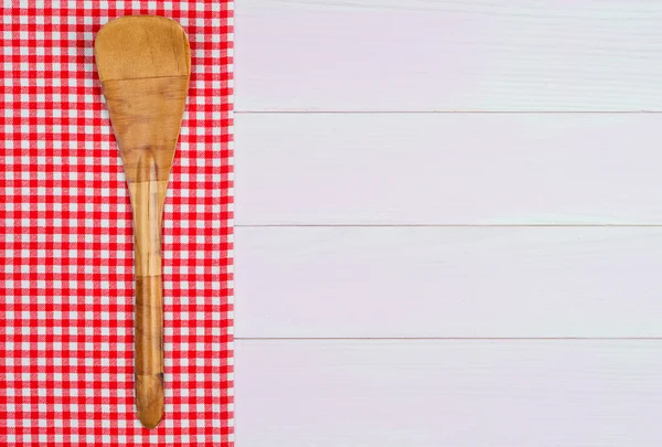 Kitchenware on red towel — Stock Photo, Image