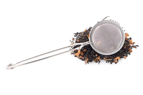 Black dry tea with petals — Stock Photo, Image