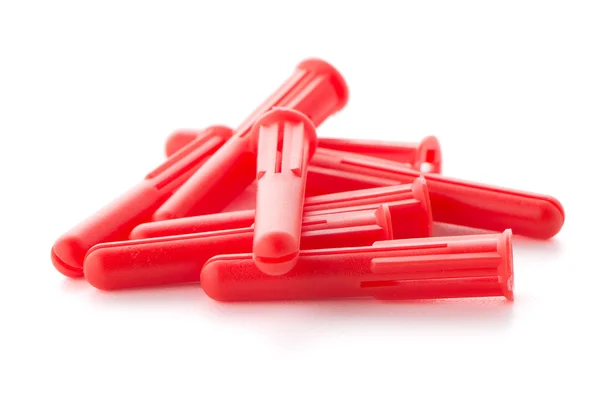 Red plastic dowels — Stock Photo, Image