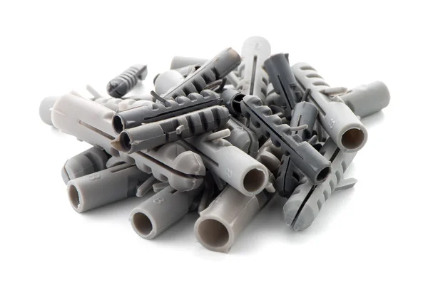 Grey plastic dowels — Stock Photo, Image