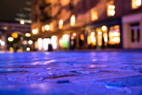 Verschwommenes Hintergrundbild Der Kopfsteinpflasterstraße Und Lichter Von New York City Stockfoto