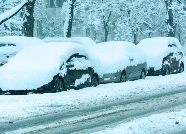 Snowy winter road with cars  in snow storm — Stock Photo, Image