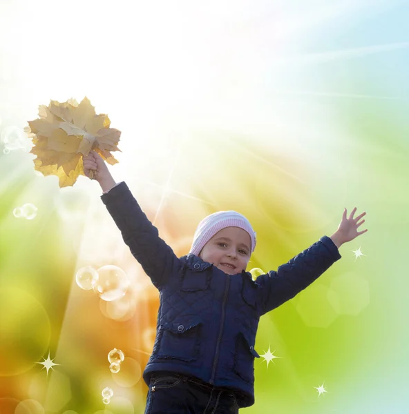 Happy Little Girl with bouquet autumn yellow dry leaves — Stock Photo, Image