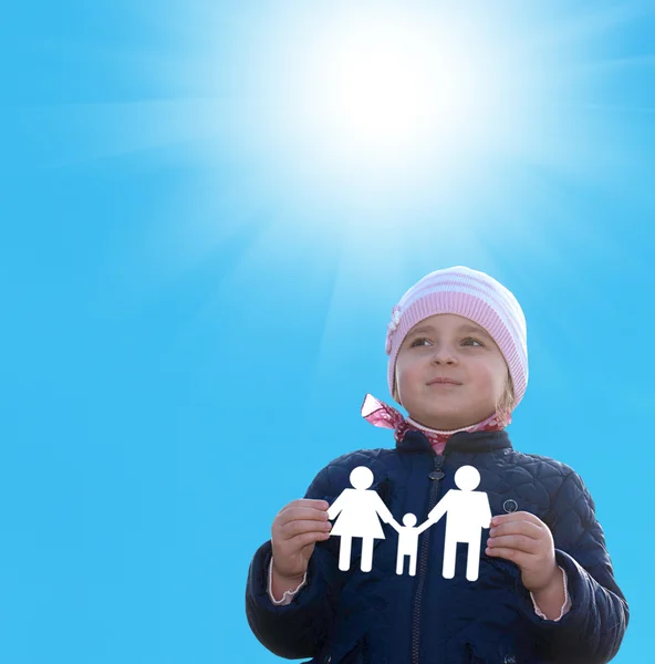 Little happy Girl with paper family on hands.Happiness Family — Stock Photo, Image