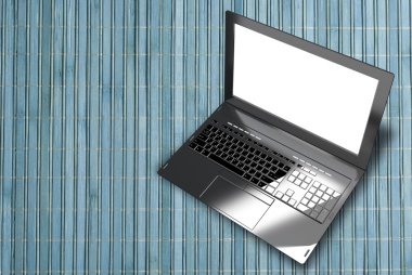 Yeni modern dizüstü closeup ahşap mavi ışık arka plan üzerinde