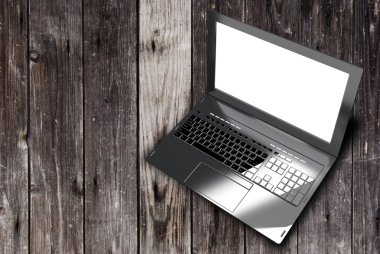 Yeni modern dizüstü closeup ahşap eski arka plan üzerinde