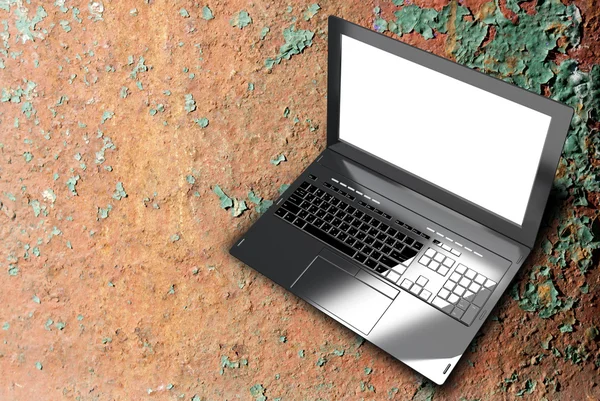 Nya moderna laptop närbild på metall rostig gammal bakgrund — Stockfoto