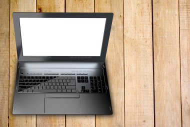 Yeni modern dizüstü closeup ahşap eski arka plan üzerinde