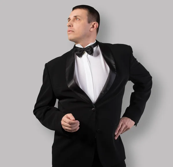 Caucasian adult man in classic tuxedo — Stock Photo, Image