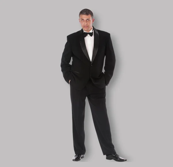 Caucasian adult man in classic tuxedo — Stock Photo, Image