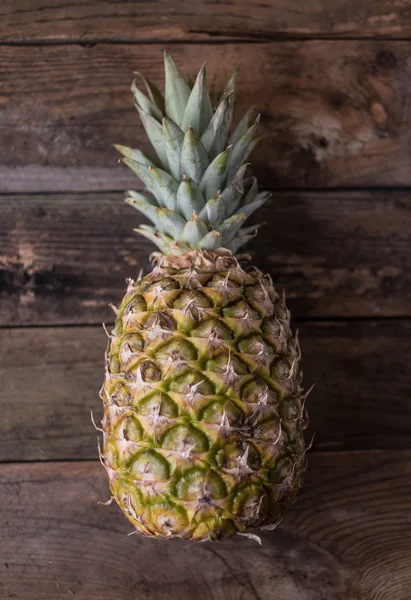 Fresh pineapple on wood — Stock Photo, Image
