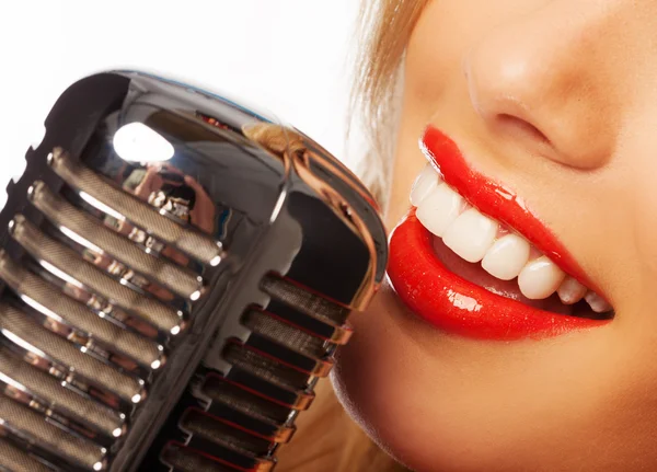 Woman lips with retro microphone — Stock Photo, Image