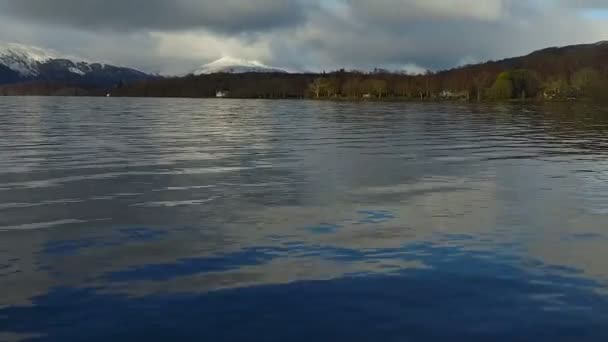 Aerial: Loch Tay in the Scottish Highlands during a clear winters day with snow on Ben Lawers, Scotland — Stock Video