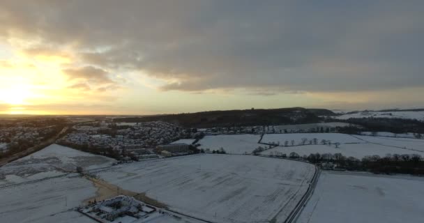 Aerial: Fields during winter covered with snow near Edinburgh, Scotland — Stock Video