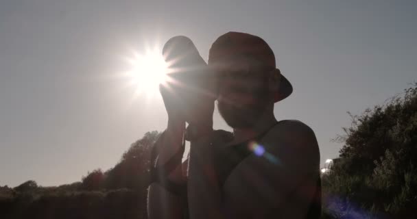 Fotografování při západu slunce — Stock video