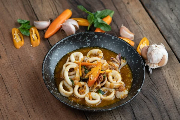 Stir Fried Squid Spicy Chili Garlic Basil Sauce Isolated Wooden — Stock Photo, Image