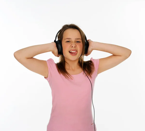 Fille avec écouteurs écouter de la musique — Photo