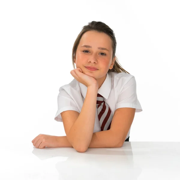 Bored young girl in school uniform — Stock Photo, Image