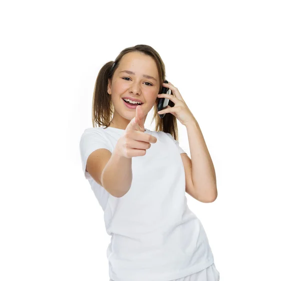 Laughing young girl giving a thumbs up gesture — Stock Photo, Image