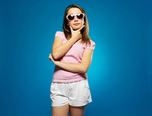 Thoughtful trendy young girl in sunglasses — Stock Photo, Image